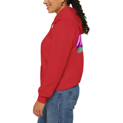 A person wearing the "Protect Trans Kids Hoodie - Australian Shipping," a red unisex heavy blend hoodie with colorful text on the back, and blue jeans smiles while standing sideways against a plain white background.