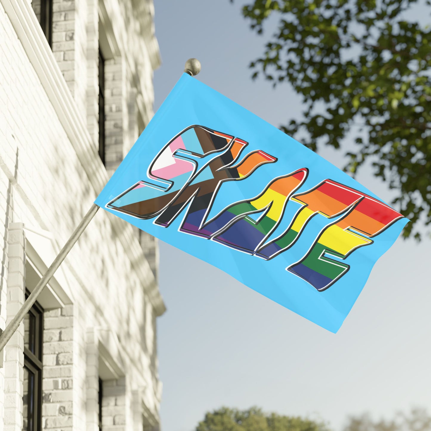 The "SKATE progress pride original logo flag - blue" by Printify features a light blue polyester organza material. The word "SKATE" is prominently displayed in large, bold letters, with each letter filled using segments of various LGBTQ+ pride flags, including the rainbow pride flag and the progress pride flag, celebrating queer skating pride.