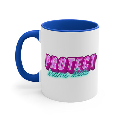 The Protect Trans Kids colourful accent mug by Printify is a white ceramic mug with a black handle and inner rim. It features a vibrant design that says "PROTECT trans kids" in bold, gradient lettering. The word "PROTECT" is in pink and purple, while "trans kids" is in teal, showcasing transgender pride.