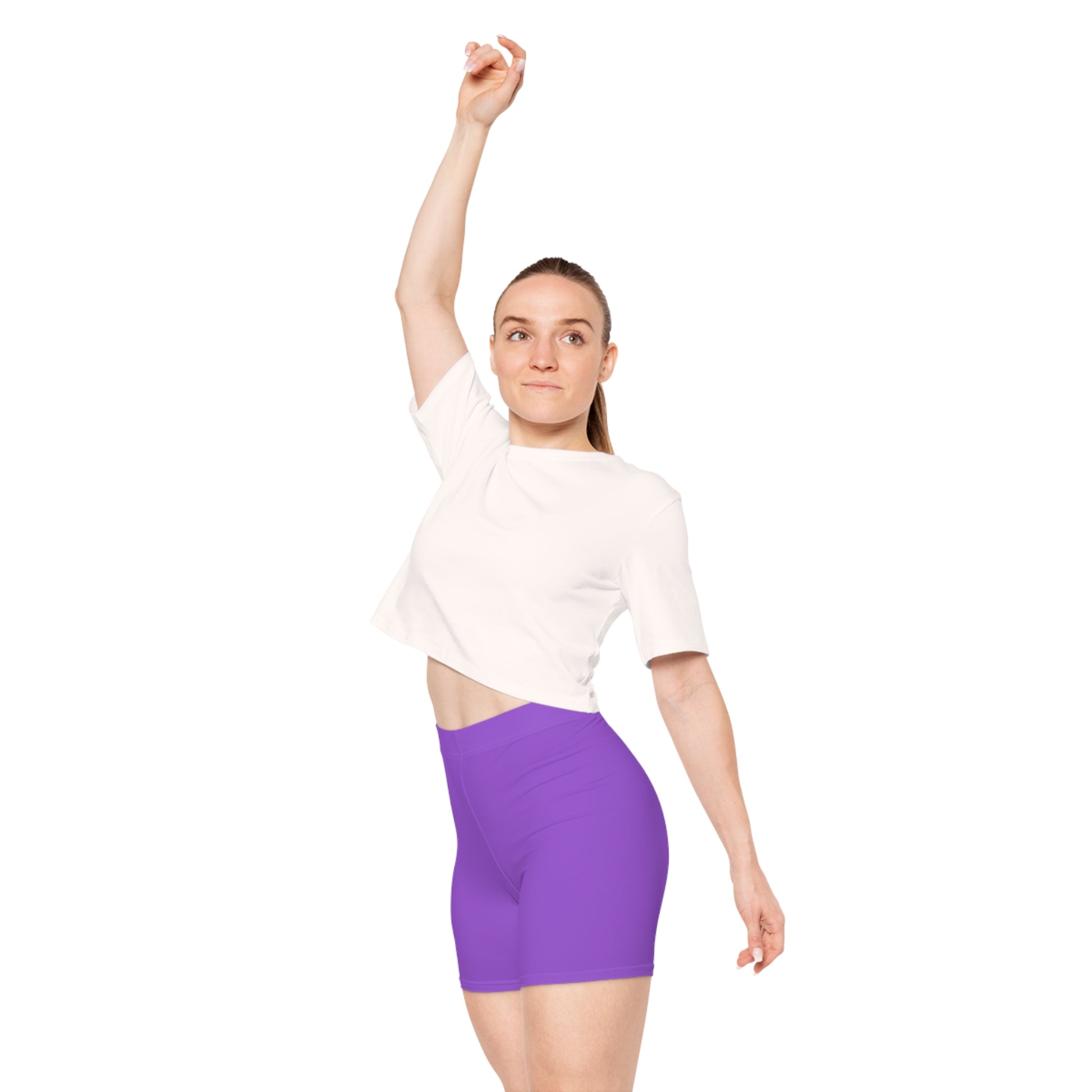 A person is wearing Non-binary Pride Flag Bike pants, featuring moisture-wicking polyester material and vertical stripes in black, purple, white, and yellow on the side - the nonbinary pride flag. The image shows the lower torso and upper thigh area from a side view.