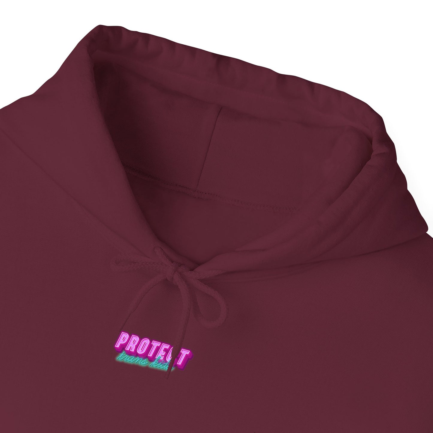 The "Protect Trans Kids Hoodie - Australian Shipping" is a maroon unisex sweatshirt featuring a drawstring and bold embroidery on the chest. The message "PROTECT Trans Kids" is in vibrant pink and teal, made from ethically grown cotton for style and conscience.