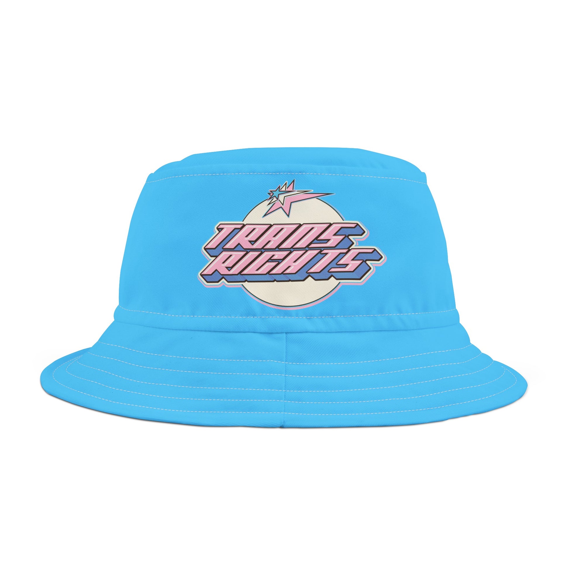 The Trans Rights Blue Bucket Hat is an adorable blue accessory adorned with a stylized graphic illustration. It features the bold, retro-inspired text "TRANS RIGHTS" in shades of pink, white, and blue (the trans flag) on a white  background, accented with pink and blue sparkles. Crafted from practical polyester, it's both stylish and functional.