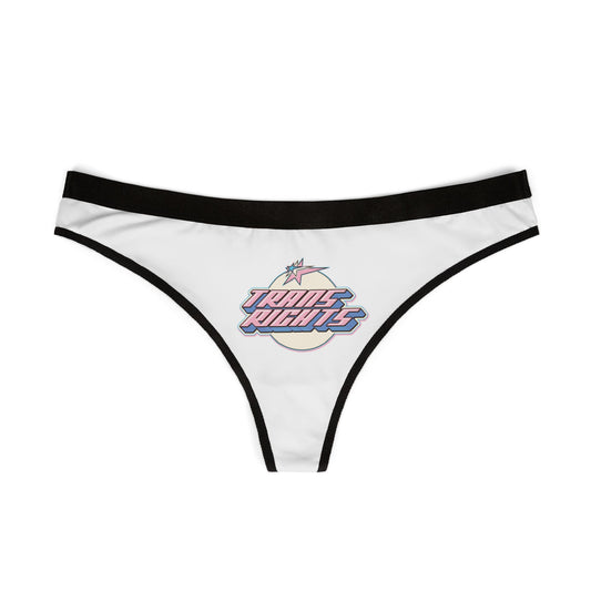 The Trans Rights g-string or thong by Printify boasts a white base with black elastic trim, showcasing a vibrant graphic at its front center. This original design, inspired by the trans flag, features a circle with lightning bolts and bold "TRANS RIGHTS" text in shades of pink, blue, and purple—ideal for everyday wear.