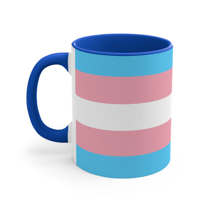 The Trans Pride Flag Colourful Accent Mug by Printify features a ceramic design with horizontal stripes in blue, pink, and white. Its solid blue handle perfectly complements the colorful interior.