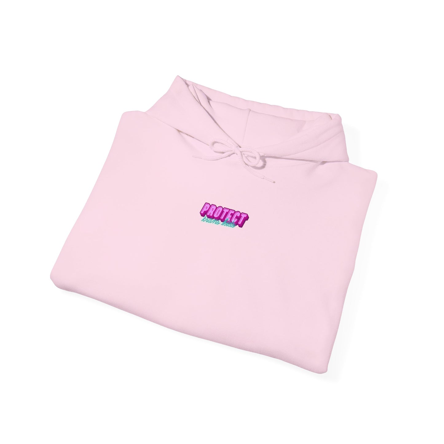 A light pink "Protect Trans Kids Hoodie - Australian Shipping," crafted from ethically grown cotton, is folded neatly. It features "PROTECT" in large, colorful letters with smaller text below. This unisex heavy blend sweatshirt includes a hood and drawstrings, set against a plain white background.