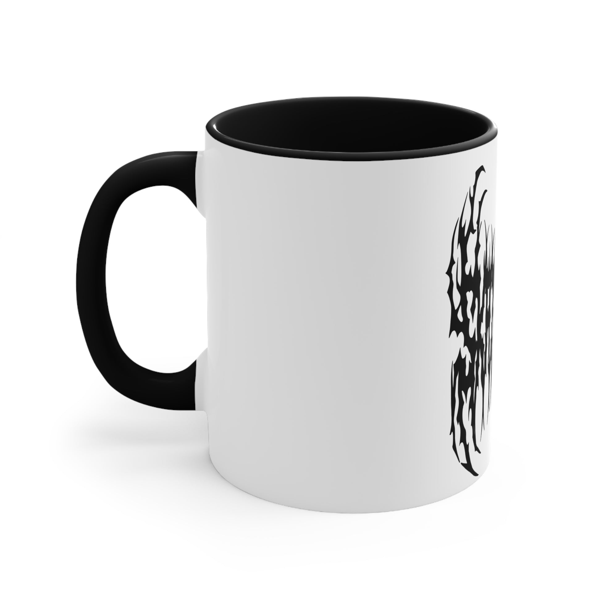 The "SKATING IS GAY but make it death metal accent mug" by Printify is a white mug with a black interior featuring an intricate design that resembles sharp, thorny text. Styled in a death metal font, the symmetrical design has an aggressive, edgy appearance that makes the text difficult to read due to its complex, spiky style.