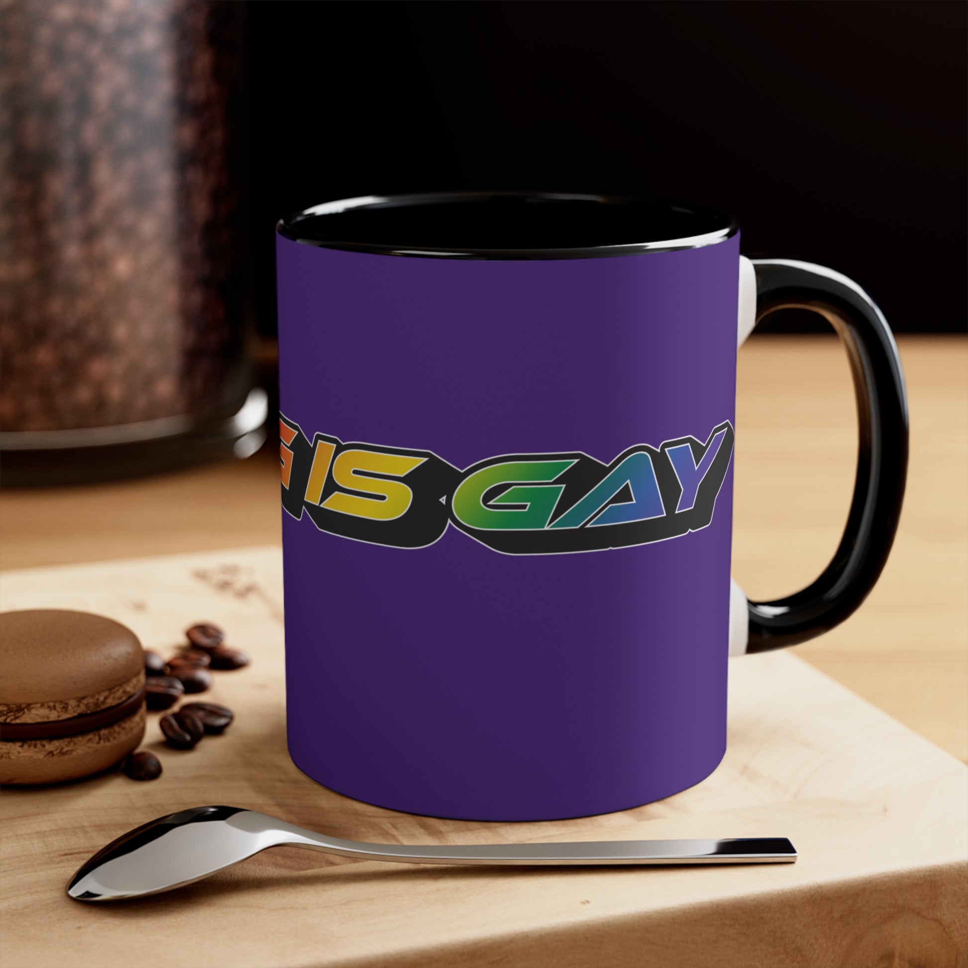 Displayed is the SKATING IS GAY rainbow gradient accent mug by Printify. This eye-catching mug features a purple exterior and a colorful interior, with the text "SKATING IS GAY" displayed in gradient colors of red, orange, yellow, and green. The dynamic design is enhanced by its shadowed font style.