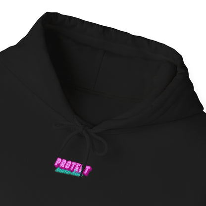 The Protect Trans Kids Hoodie in black is crafted from ethically grown cotton, featuring a colorful embroidered logo with "PROTEKT Transmitted" in neon pink and green on the chest. This unisex hoodie includes a comfortable neck drawstring. Available for Australian shipping.