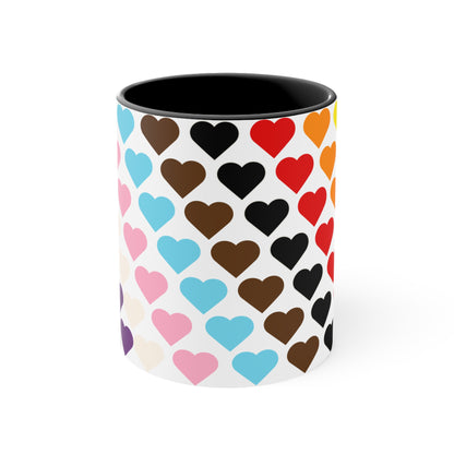 Introducing the Progress Pride Flag Love Hearts - Colourful Accent Mug by Printify: a ceramic mug featuring a vibrant red handle and a lively interior, adorned with diagonally arranged rows of hearts in shades of purple, blue, pink, green, and yellow. The hearts are evenly spaced across the surface, creating a charming and festive design.