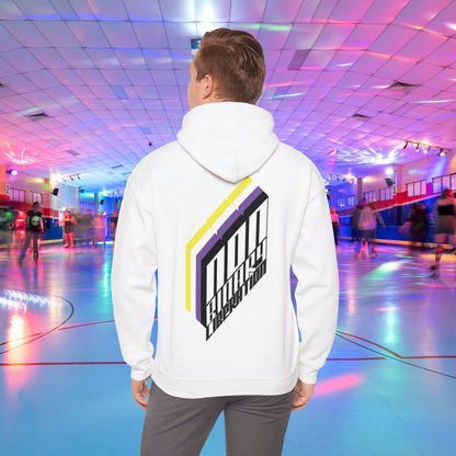 A person wearing the Non-Binary Liberation Hoodie - Australian Shipping by Printify, showcasing a vibrant geometric design on the back in nonbinary pride flag colours, stands in the middle of a roller skating rink. The rink is bathed in vibrant lights of various colors, with several people skating in the background.