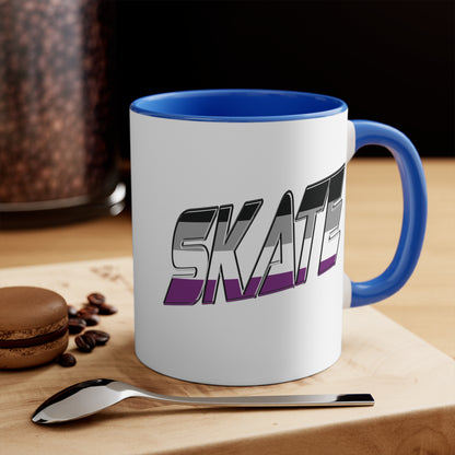 The SKATE asexual pride flag accent mug from Printify features a striking design: a white base with a black handle and vibrant interior. The word "SKATE" is boldly displayed on the side in 3D-style letters, showcasing an eye-catching gradient that transitions from black and gray at the top to purple at the bottom.