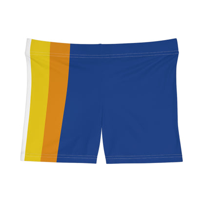 A person is wearing the Aroace Aromantic-Asexual Pride Flag Short Shorts by Printify, featuring colorful, moisture-wicking active wear in high-waisted shorts with vertical stripes in shades of blue, white, yellow, and orange. The background is plain white, and the image focuses on the side of the body from the chest down to mid-thigh.