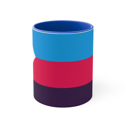 The Polyamory Pride Flag cup - colorful accent mug by Printify features a white coffee mug with a red handle and a vibrant interior. The exterior design showcases a colorful heart on a white background, accompanied by distinctive elements including a blue triangle, pink stripe, and purple stripe.