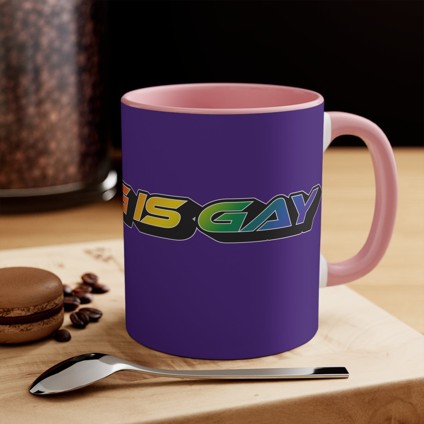 Displayed is the SKATING IS GAY rainbow gradient accent mug by Printify. This eye-catching mug features a purple exterior and a colorful interior, with the text "SKATING IS GAY" displayed in gradient colors of red, orange, yellow, and green. The dynamic design is enhanced by its shadowed font style.