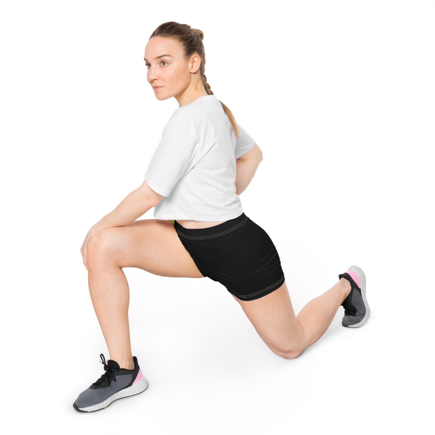 A person is modeling the Non-Binary Pride Flag Short Shorts by Printify, featuring high-waisted custom stripes in black, purple, white, and yellow. Made from moisture-wicking fabric that includes polyester and spandex, the shorts are displayed from the lower torso to the upper thigh.