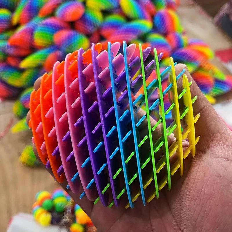 Colourful 3D rainbow fidget toy perfect for stress relief and sensory needs. Flexible, stretchy mesh design