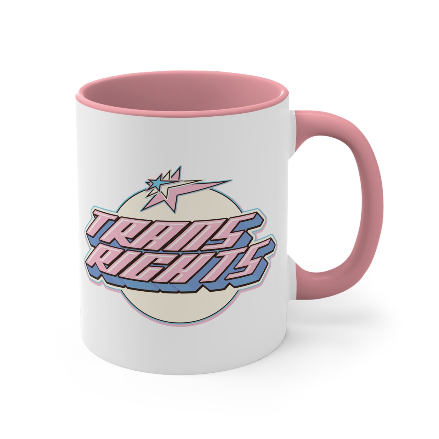 The Trans Rights colorful accent mug by Printify showcases a white coffee mug with a pink handle and vibrant interior, featuring the bold, retro-style text "TRANS RIGHTS" against a circular, off-white background. Above the text is a stylized star with dynamic lines that reflect the colors of the transgender pride flag, creating an energetic sense of movement.