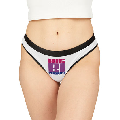 A pair of the BIG BI ENERGY g-string thong from Printify, made with breathable antimicrobial fabric featuring white material and black trim. The front showcases a bold, multicolored design that reads "BIG BI ENERGY" in uppercase letters, with "BIG" in pink and "ENERGY" in blue, incorporating the bisexual pride flag colors.