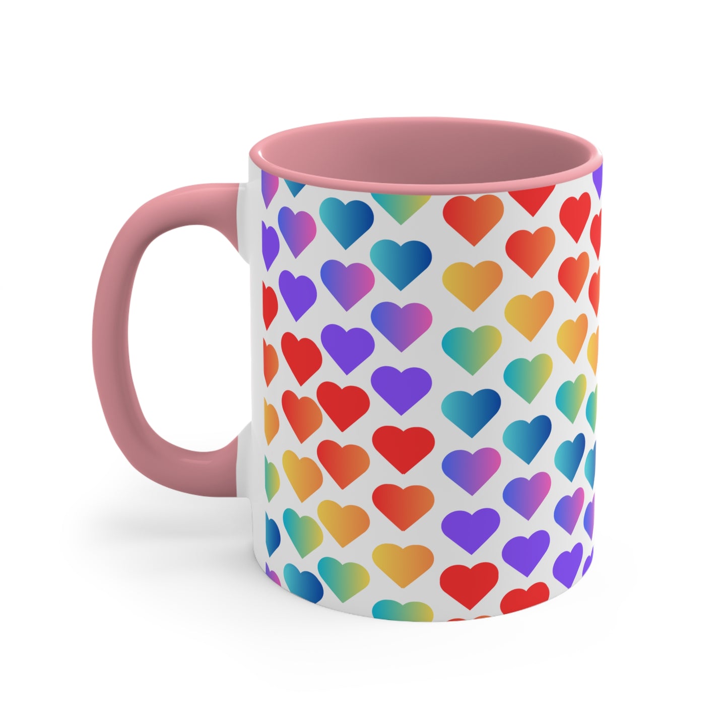 The Rainbow Pride Love Hearts Colorful Accent Mug by Printify is a white mug with a red handle and a colorful interior, adorned with a vibrant pattern of gradient hearts. The hearts transition through various colors, creating an eye-catching color contrast against the white background.