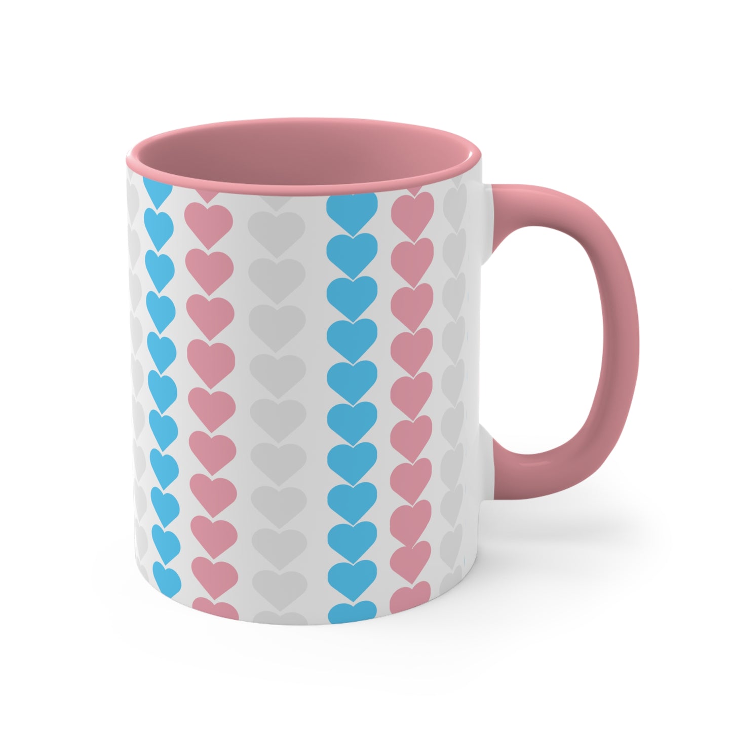 The Trans pride flag love hearts colourful accent mug by Printify features a white exterior adorned with vertical rows of pink, blue, and white hearts, reminiscent of the trans pride flag. Its cheerful and colorful appearance is enhanced by the pink handle and inner rim.