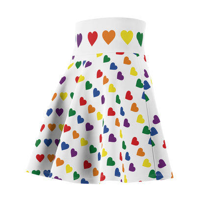 Introducing the Rainbow Pride Hearts Skater Skirt by Gay Skate: a white pleated skater skirt adorned with a pattern of colorful pride flag rainbow hearts in various sizes. The hearts come in vibrant shades of red, orange, yellow, green, blue, and purple. Featuring a cozy soft touch and a waistband highlighted with purple hearts, this versatile piece is sure to become an everyday favorite.