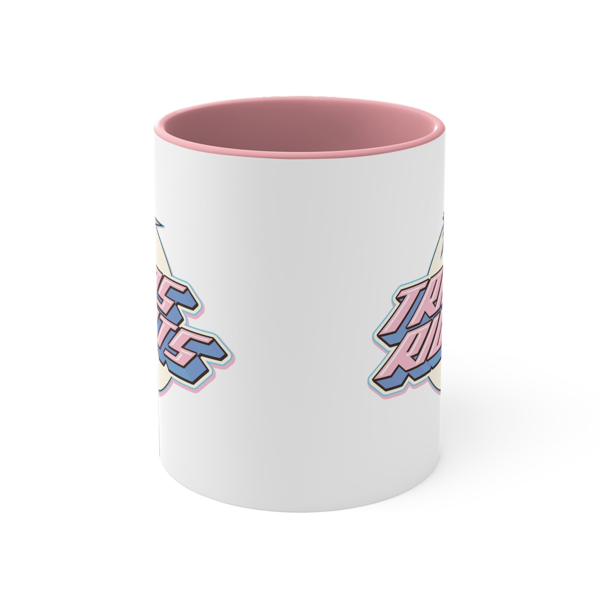 The Trans Rights colorful accent mug by Printify showcases a white coffee mug with a pink handle and vibrant interior, featuring the bold, retro-style text "TRANS RIGHTS" against a circular, off-white background. Above the text is a stylized star with dynamic lines that reflect the colors of the transgender pride flag, creating an energetic sense of movement.