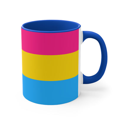 The Pansexual Pride Flag colourful accent mug from Printify features a ceramic design with a pink handle and colorful interior that showcases the colors of the pan pride flag: pink on top, yellow in the middle, and blue on the bottom.