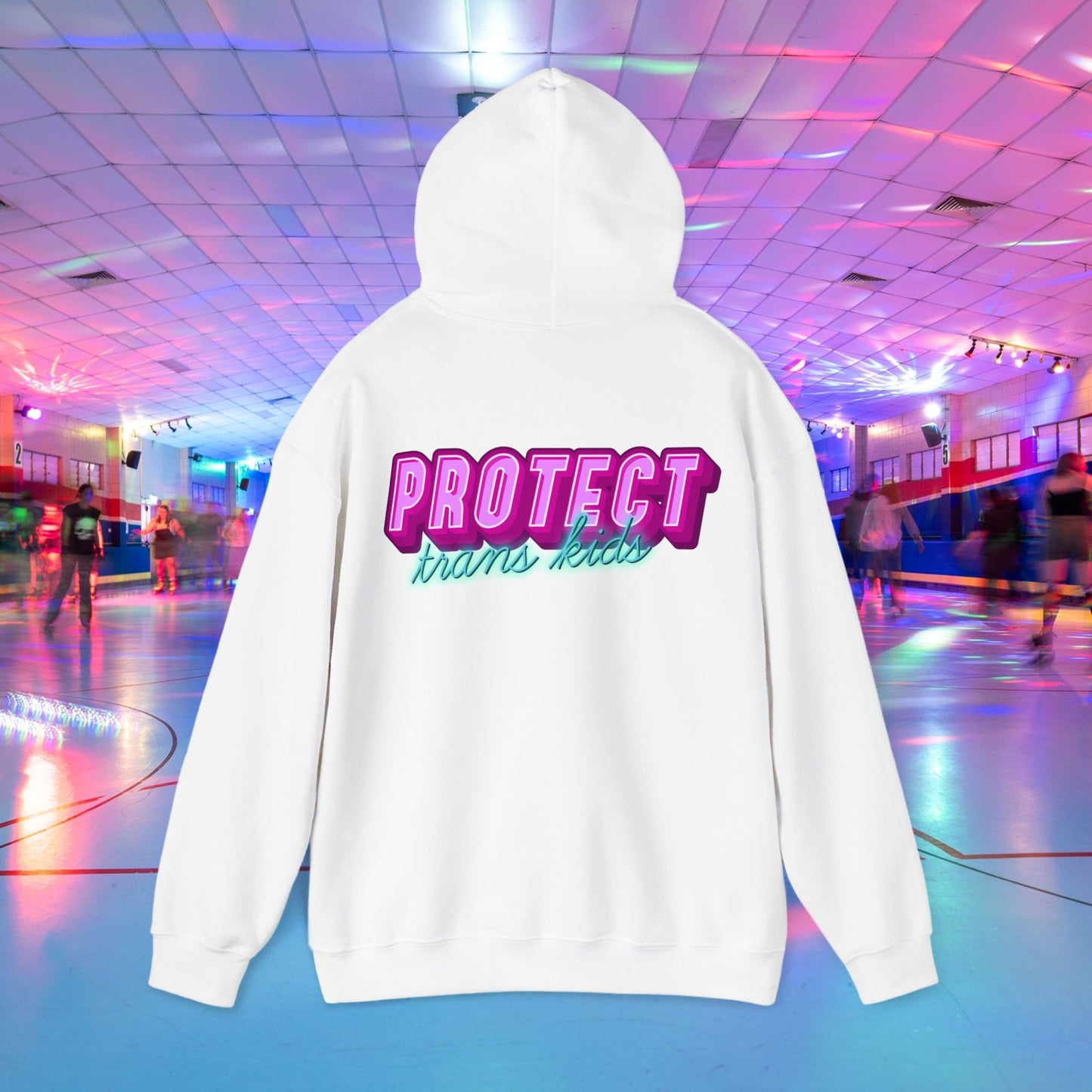 The Protect Trans Kids Hoodie - Australian Shipping is a white unisex hoodie crafted from ethically grown cotton. It boldly displays "PROTECT trans kids" in colorful letters on the back, set against a vibrant, illuminated roller skating rink filled with joyful skaters.