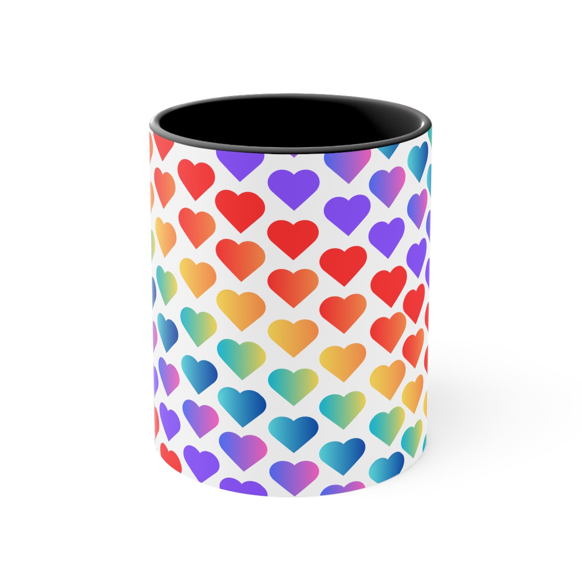 The Rainbow Pride Love Hearts Colorful Accent Mug by Printify is a white mug with a red handle and a colorful interior, adorned with a vibrant pattern of gradient hearts. The hearts transition through various colors, creating an eye-catching color contrast against the white background.