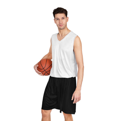 A person is standing wearing Non-Binary Pride Flag Basketball Shorts - Black from Printify, featuring an elastic waistband and side panels in vertical stripes of white, yellow, purple - thr nonbinary pride flag. The individual is shirtless, showing their midsection and a portion of their legs.