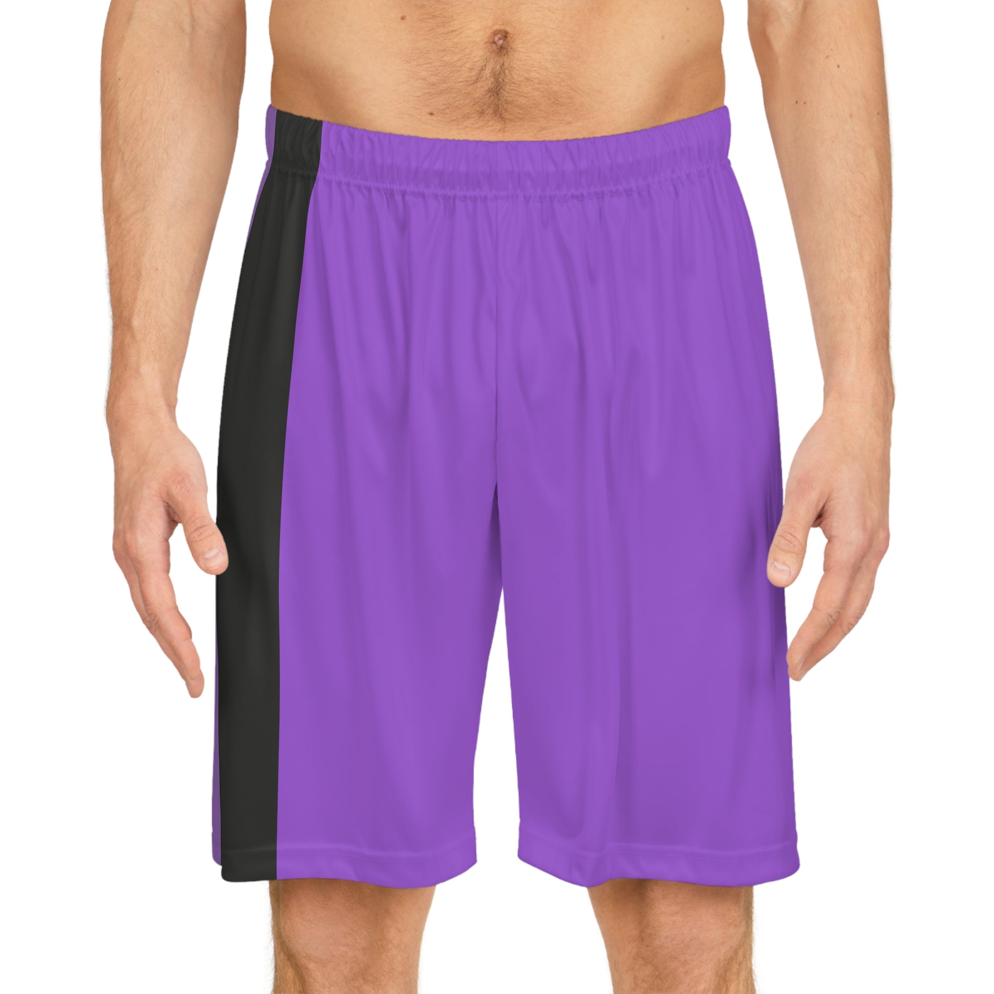 A person wearing Printify's Non-Binary Pride Flag Basketball Shorts in purple, which feature a multicolored side panel with vertical stripes of white, yellow, black, and purple, along with an adjustable waistband.