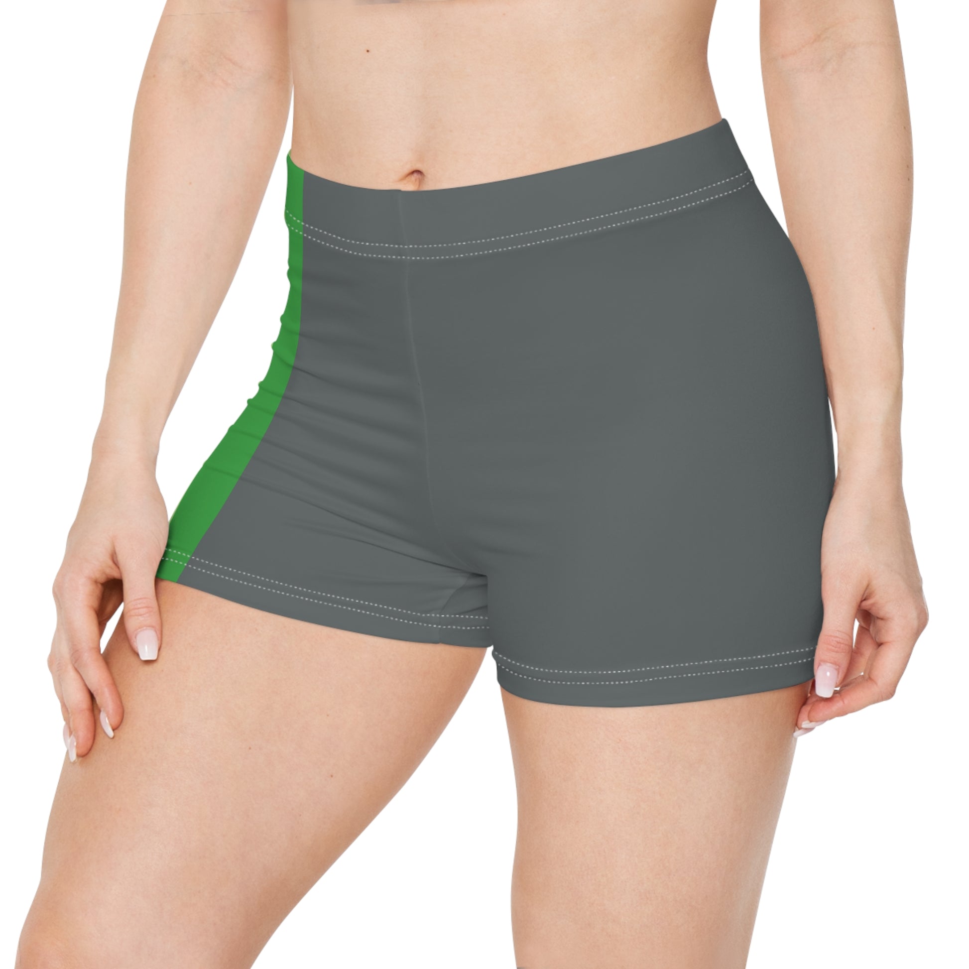 A person is shown from the side wearing Gay Skate's Aromantic Pride Flag Short Shorts, featuring vertical stripes in black, grey, white, green, and dark green. The unisex activewear shorts fit snugly. A great look for festivals, clubbing, roller derby or the gym.