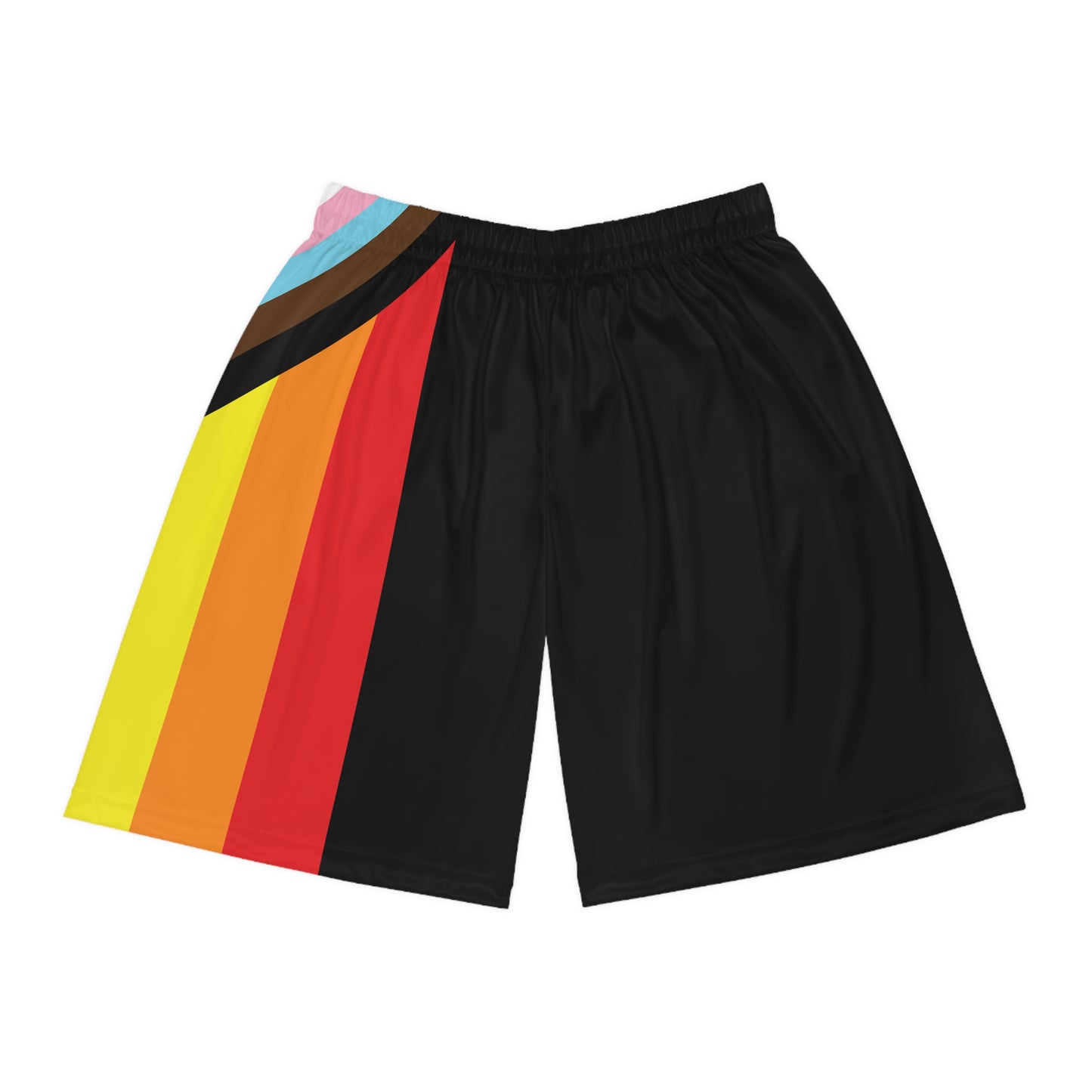 A person is wearing Printify's Progress Pride Rainbow Flag Basketball Shorts made from black, odor-resistant fabric. The shorts feature a vibrant diagonal stripe design in red, orange, yellow, green, blue, brown, black, light blue, pink, and white on the left side. The person's torso is partially visible.