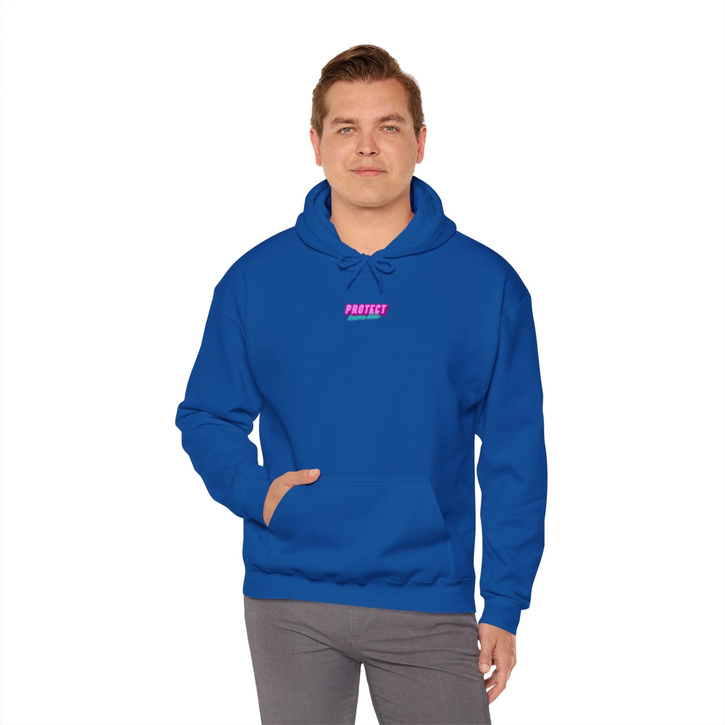 A person wearing a blue Protect Trans Kids Hoodie with a small pink "PROTECT" logo on the front stands against a white background, left hand in pocket. Crafted from ethically grown cotton, it's unisex and heavy blend.