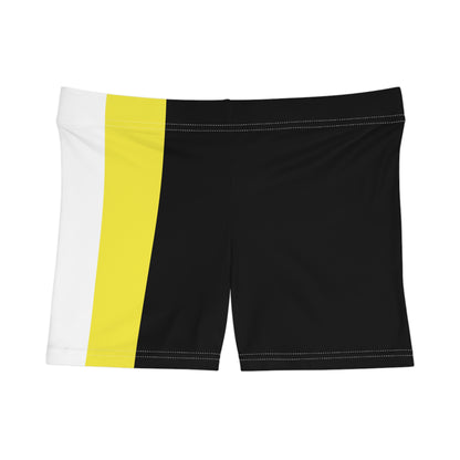 A person is modeling the Non-Binary Pride Flag Short Shorts by Printify, featuring high-waisted custom stripes in black, purple, white, and yellow. Made from moisture-wicking fabric that includes polyester and spandex, the shorts are displayed from the lower torso to the upper thigh.