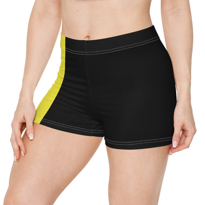 A person is modeling the Non-Binary Pride Flag Short Shorts by Printify, featuring high-waisted custom stripes in black, purple, white, and yellow. Made from moisture-wicking fabric that includes polyester and spandex, the shorts are displayed from the lower torso to the upper thigh.