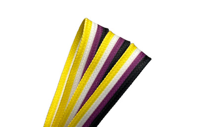 Three pairs of colorful shoelaces are displayed. The first pair is yellow with black and purple stripes, the second pair features a Pride flag pattern, and the third pair is pale pink with teal and coral stripes. All shoelaces are Waxed Skate Laces by Derby Laces, proudly presented under the Gay Skate brand.