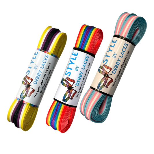 Three pairs of colorful shoelaces are displayed. The first pair is yellow with black and purple stripes, the second pair features a Pride flag pattern, and the third pair is pale pink with teal and coral stripes. All shoelaces are Waxed Skate Laces by Derby Laces, proudly presented under the Gay Skate brand.