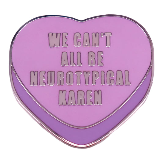 The "We Can't All Be Neurotypical Karen" purple enamel pin by Gay Skate celebrates neurodiversity with a heart-shaped design.