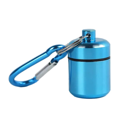 A small metallic blue cylindrical medication medicine pill container and a matching blue carabiner 