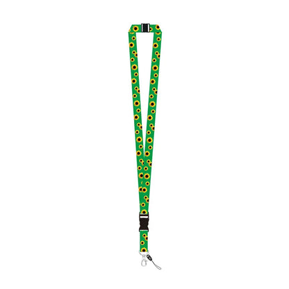 A green lanyard strap with a repeating Invisible Disability sunflower print, featuring black plastic buckles and a silver metal carabiner clip at the bottom