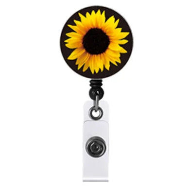 A retractable badge reel with invisible disability sunflower on a black background