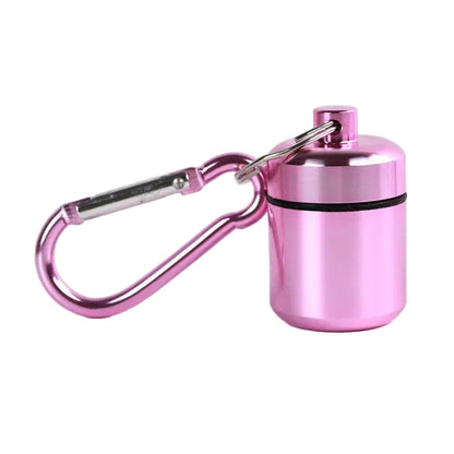 A metallic pink portable container with a matching pink carabiner clip