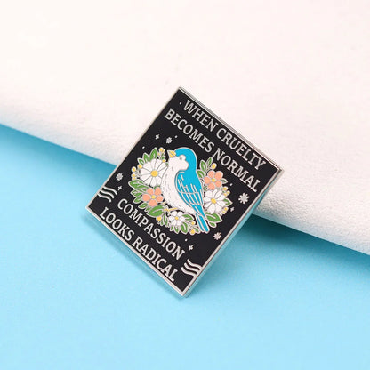 When Cruelty Becomes Normal Compassion Looks Radical - enamel pin
