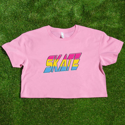 The TRANS RIGHTS original design - locally printed crop tee by Gay Skate is a black cropped T-shirt featuring a vibrant graphic in the center with bold, stylized text reading "TRANS RIGHTS." The design incorporates pastel shades and a lightning bolt motif above the text, celebrating transgender pride.