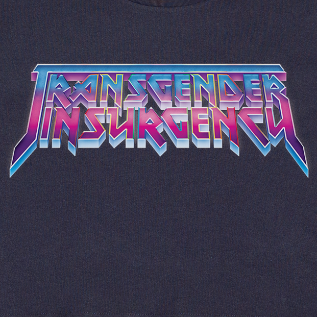 The image shows the "Transgender Insurgency and Transexual Insurgency" logo in bold, colorful, metallic letters on a dark background—featured on a locally hand-printed fundraising t-shirt.