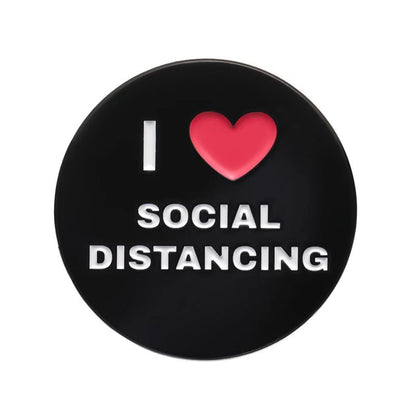 Button with 'I ❤️ Social Distancing' text on a black background