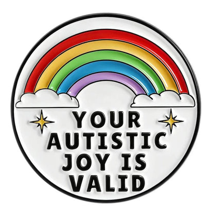Button badge with rainbow, clouds, and text 'Your Autistic Joy Is Valid' 
