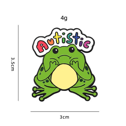 Sticker of a green frog with rainbow 'Autistic' text and measurements on a white background