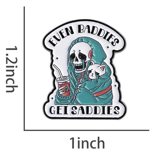 Badge with a skeleton holding a cat and text 'Even Baddies Get Saddies' background.